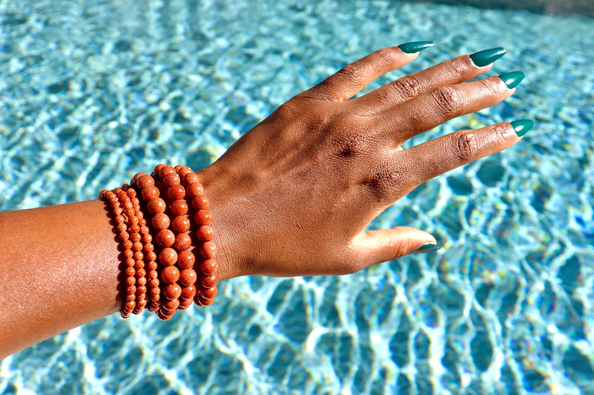 4 mm and 6-8 mm goldstone bracelets
